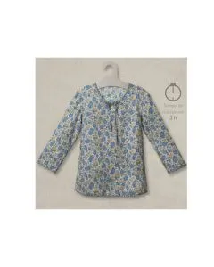 Impecable Blusa de flores cielo intenso.